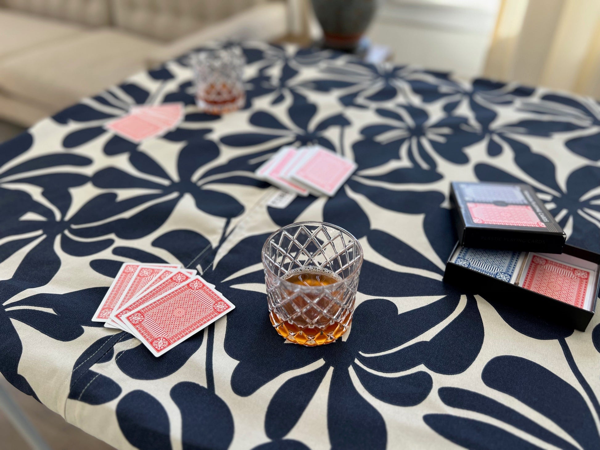 Using the square fitted tablecloth to play a card game